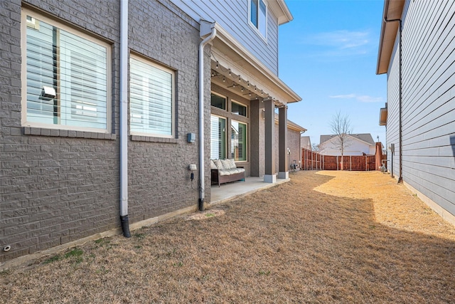 view of yard with a patio and fence private yard