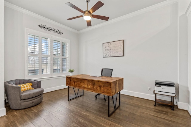 office featuring a ceiling fan, dark wood finished floors, crown molding, and baseboards