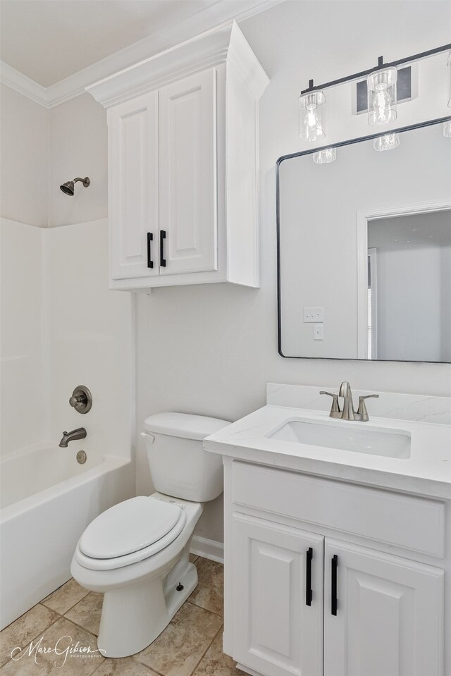 full bath with a walk in closet, tile patterned floors, a sink, and double vanity