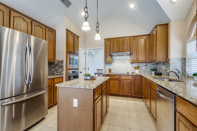 kitchen featuring light tile patterned floors, visible vents, appliances with stainless steel finishes, brown cabinetry, and a sink