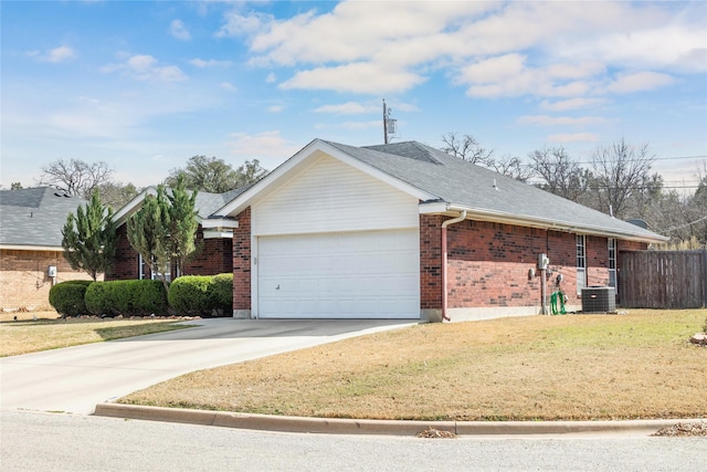 view of home's exterior featuring brick siding, a yard, an attached garage, fence, and driveway