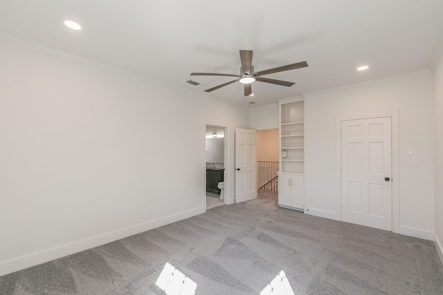 unfurnished bedroom featuring recessed lighting, light colored carpet, visible vents, baseboards, and ornamental molding