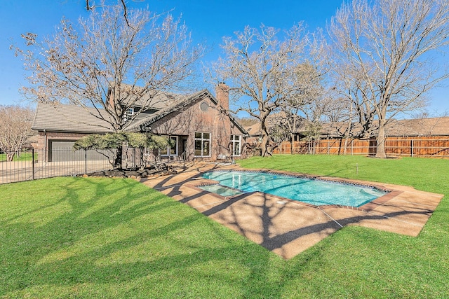 view of pool with a fenced backyard, a yard, a hot tub, and a patio