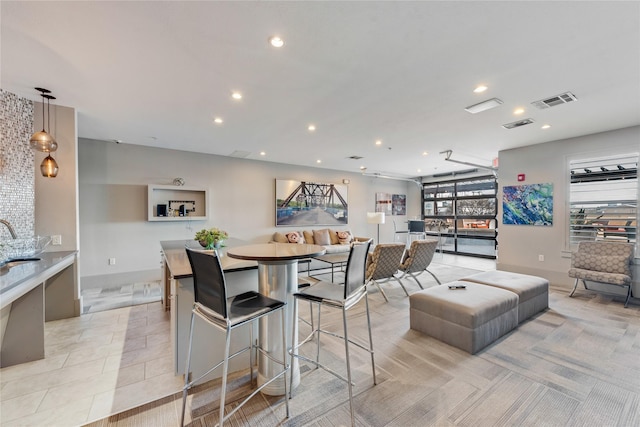 dining area with recessed lighting, visible vents, and light tile patterned floors