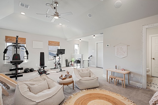 interior space featuring carpet, lofted ceiling, recessed lighting, visible vents, and baseboards