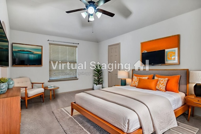 carpeted bedroom featuring a ceiling fan