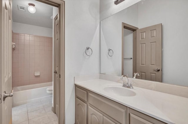 full bath featuring visible vents, toilet, tile patterned floors,  shower combination, and vanity