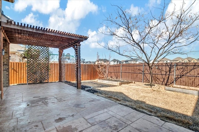 view of patio / terrace with a garden, a fenced backyard, and a pergola