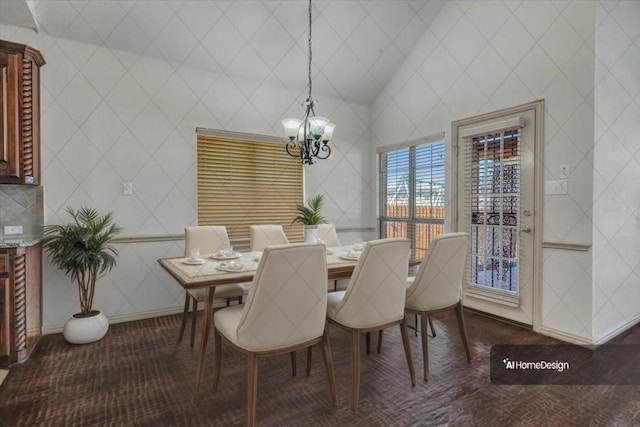 dining space with a chandelier