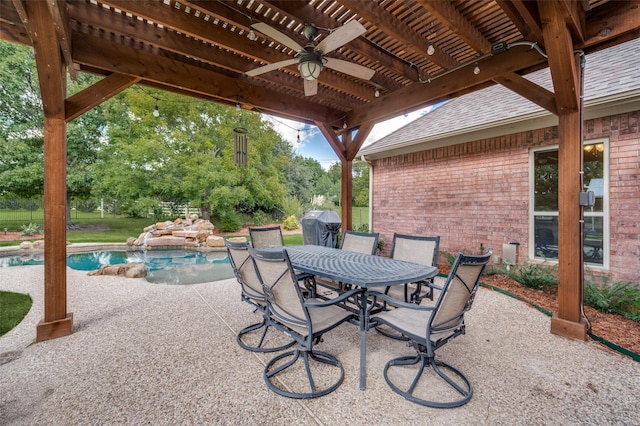 view of patio / terrace with ceiling fan, an outdoor pool, grilling area, a pergola, and outdoor dining space