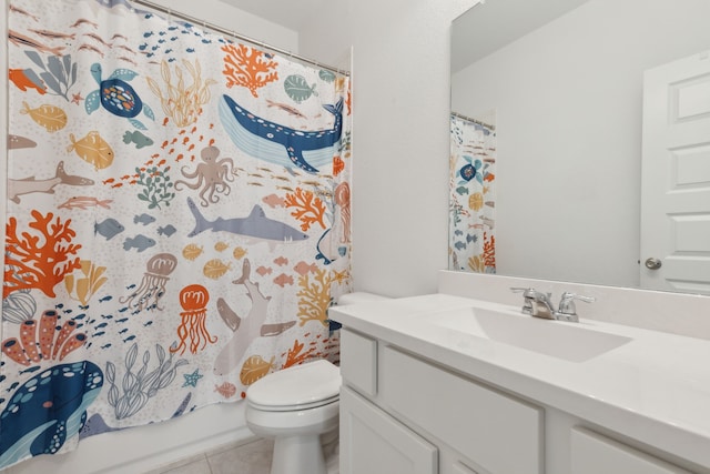 full bath with vanity, tile patterned flooring, and toilet