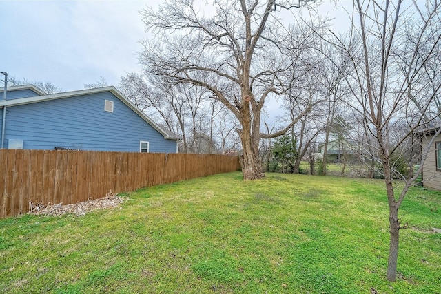 view of yard with fence