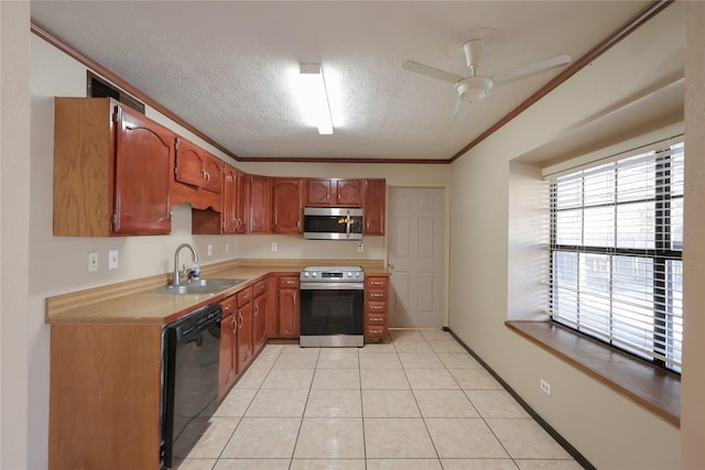 kitchen featuring appliances with stainless steel finishes, ornamental molding, light countertops, a textured ceiling, and a sink