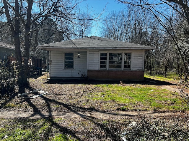 bungalow with brick siding