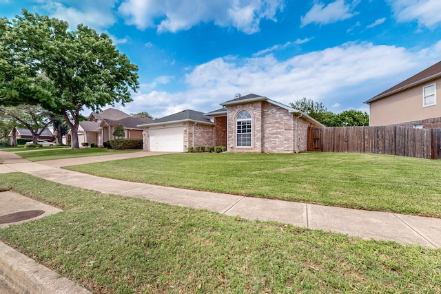 211 Ember Glen Dr, Arlington, TX 76018 - single story home with concrete driveway, an attached garage, and brick siding