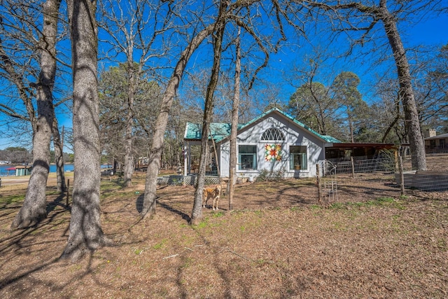 view of front of property with fence