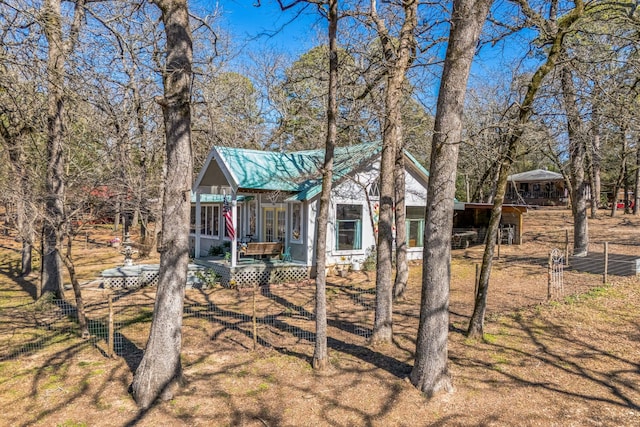 view of yard featuring fence and a wooden deck