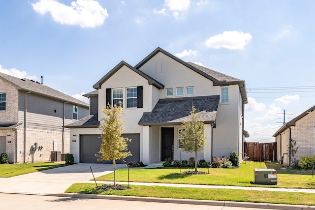 view of front of home featuring an attached garage, central air condition unit, fence, concrete driveway, and a front yard