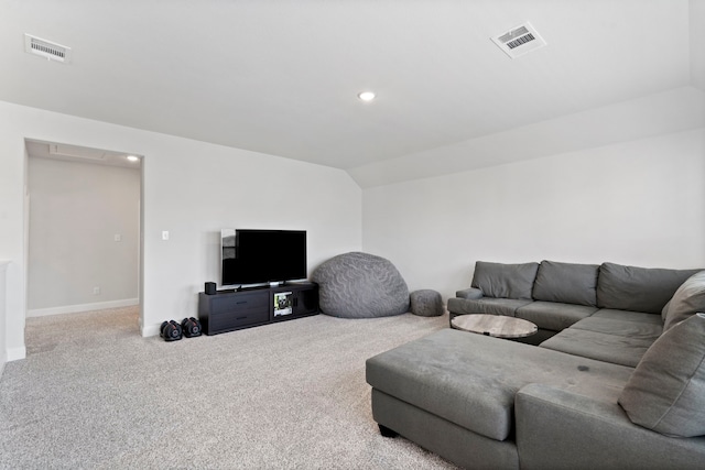 carpeted living area with vaulted ceiling, recessed lighting, visible vents, and baseboards