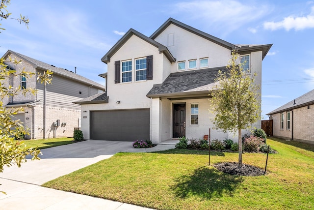 traditional-style home with stucco siding, a shingled roof, concrete driveway, an attached garage, and a front lawn