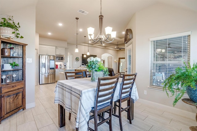 dining room featuring arched walkways, coffered ceiling, visible vents, baseboards, and an inviting chandelier