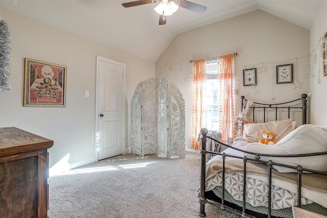 bedroom featuring lofted ceiling, ceiling fan, and carpet