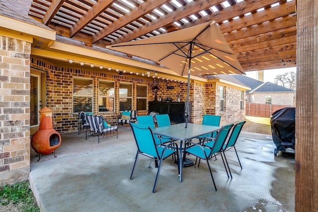 view of patio featuring outdoor dining area, a grill, fence, and a pergola