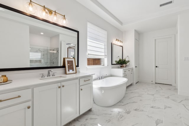 full bath featuring marble finish floor, a marble finish shower, visible vents, and vanity