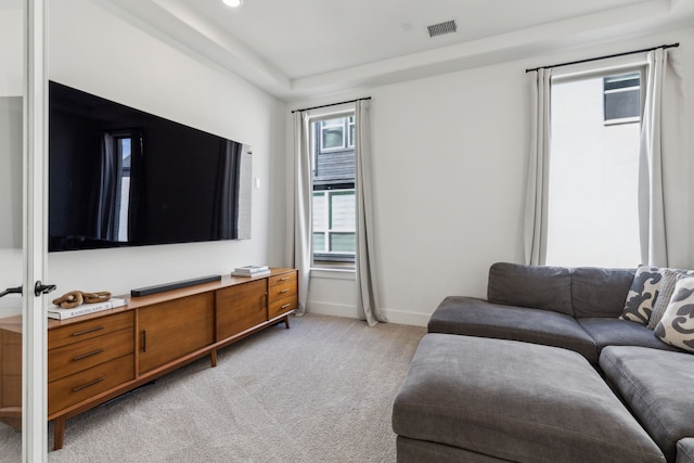 living room featuring light carpet, recessed lighting, visible vents, and baseboards