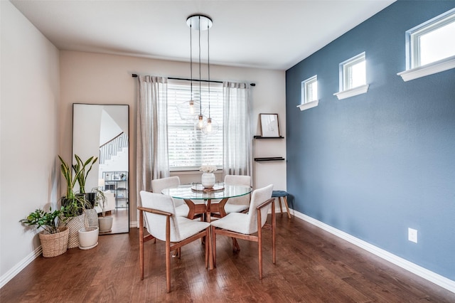2064 Olivereta Dr, Little Elm, TX 75068 - dining room featuring dark wood finished floors and baseboards