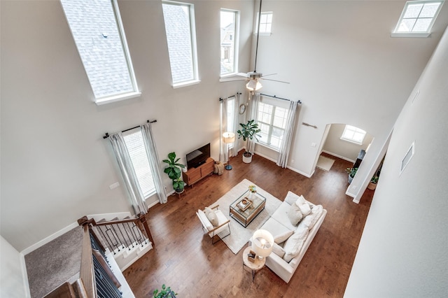 2064 Olivereta Dr, Little Elm, TX 75068 - living area featuring a towering ceiling, ceiling fan, and healthy amount of natural light