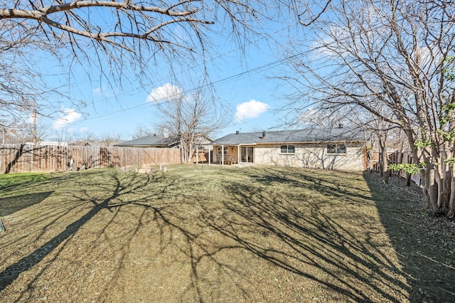 view of yard featuring fence