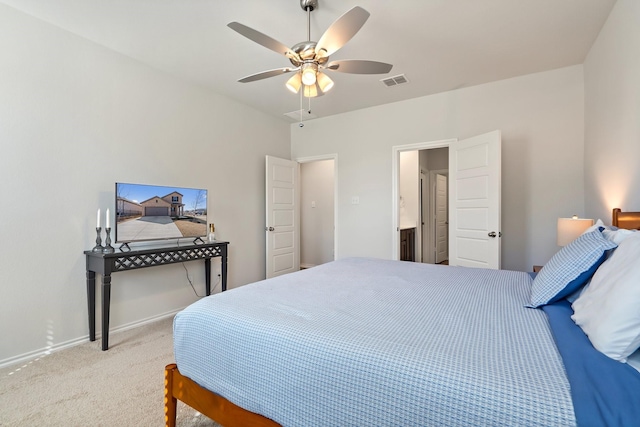 bedroom featuring ceiling fan, carpet floors, visible vents, and baseboards