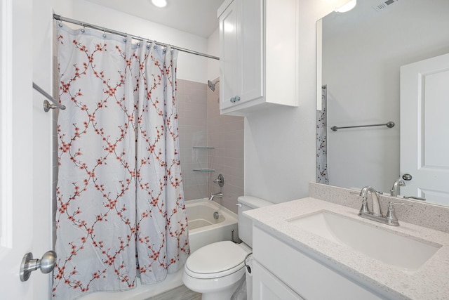 bathroom with toilet, shower / bathtub combination with curtain, visible vents, and vanity