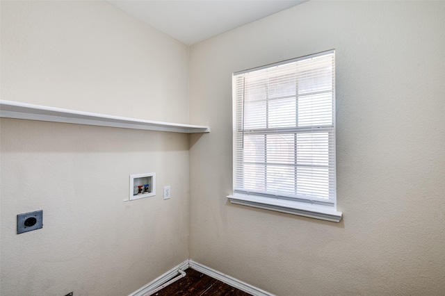 laundry room featuring laundry area, baseboards, dark wood-style floors, washer hookup, and electric dryer hookup