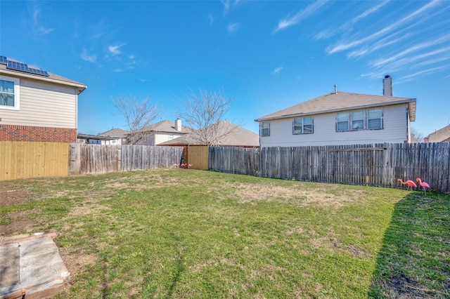 view of yard featuring a fenced backyard