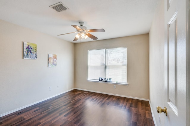 unfurnished room featuring a ceiling fan, baseboards, visible vents, and dark wood-type flooring