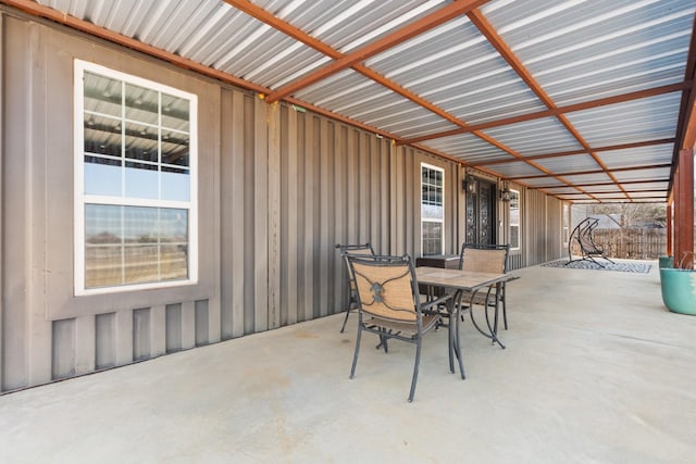 view of patio featuring outdoor dining area