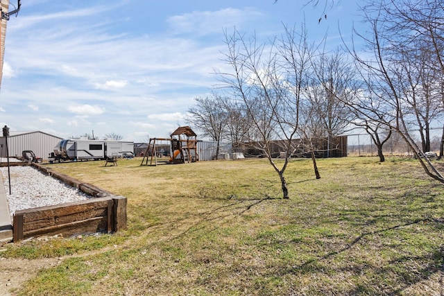 view of yard with a playground