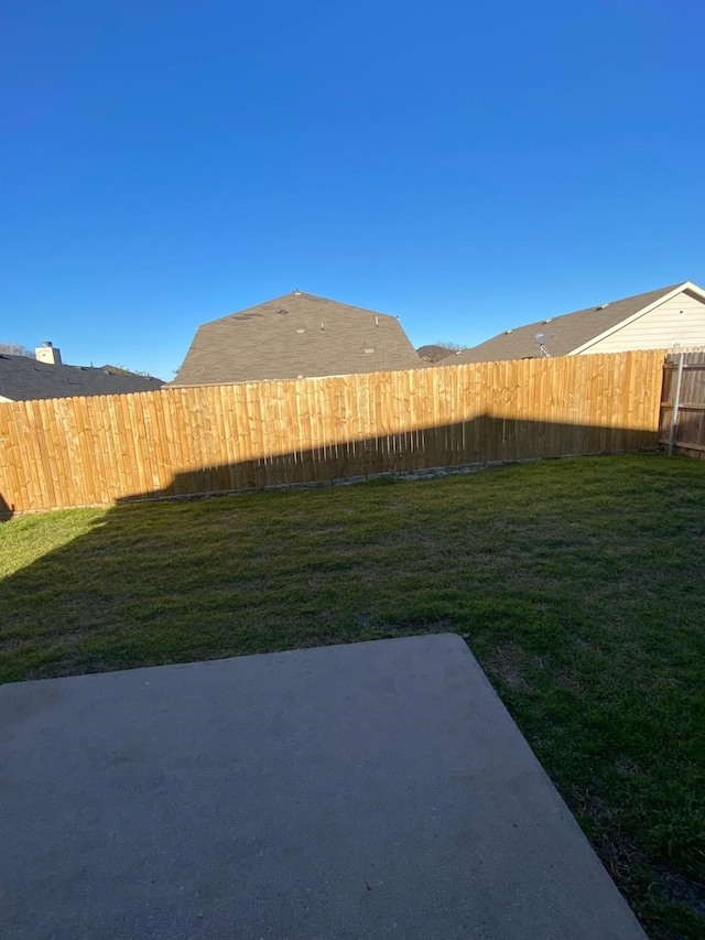 view of yard with a patio area and fence