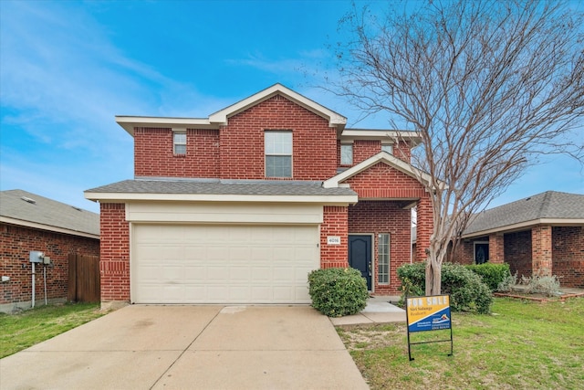 traditional-style home featuring roof with shingles, concrete driveway, a front yard, an attached garage, and brick siding