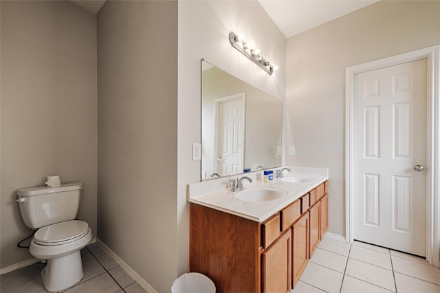 full bathroom with tile patterned flooring, a sink, and toilet