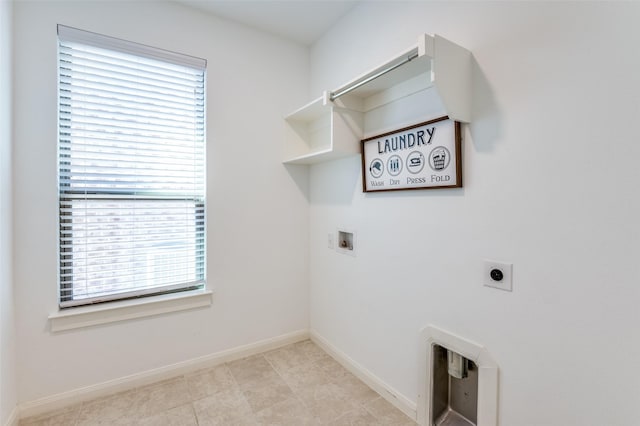 clothes washing area with laundry area, baseboards, washer hookup, and hookup for an electric dryer