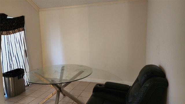 dining room with light tile patterned floors and ornamental molding