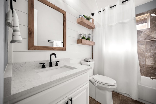 full bathroom featuring wood walls, vanity, toilet, and shower / bathtub combination with curtain