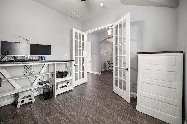 office area featuring arched walkways, french doors, vaulted ceiling, wood finished floors, and baseboards