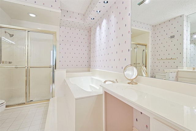 bathroom featuring toilet, wallpapered walls, a textured ceiling, and a stall shower