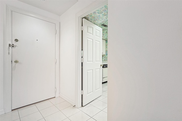 entrance foyer with light tile patterned flooring and visible vents