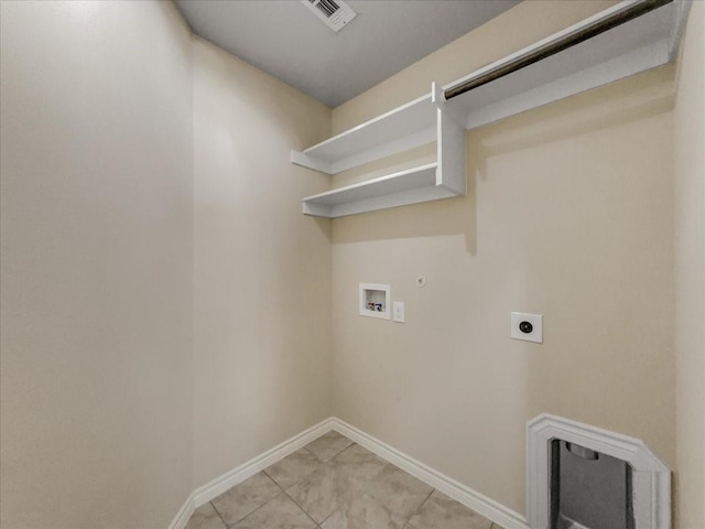 laundry room featuring washer hookup, visible vents, hookup for an electric dryer, gas dryer hookup, and laundry area