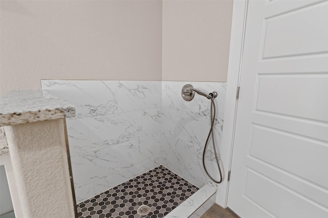 full bathroom with a shower stall